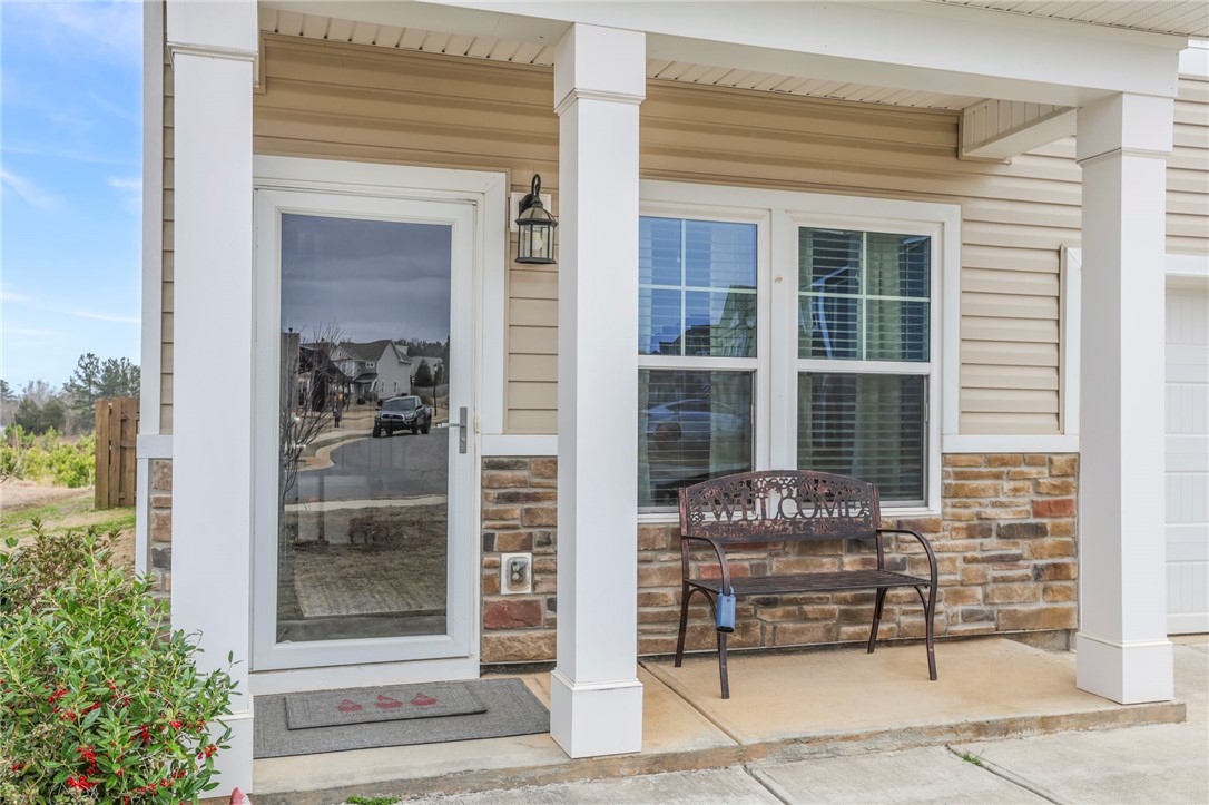 251 Samuel Street Pendleton, SC 29670 - Photo 2 of 37 This charming residence features an inviting porch, perfect for enjoying peaceful moments outdoors.