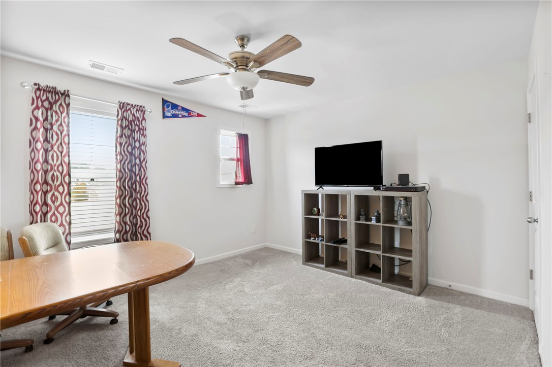 251 Samuel Street Pendleton, SC 29670 - Photo 23 of 37 This versatile room features plush carpeting and a convenient ceiling fan.