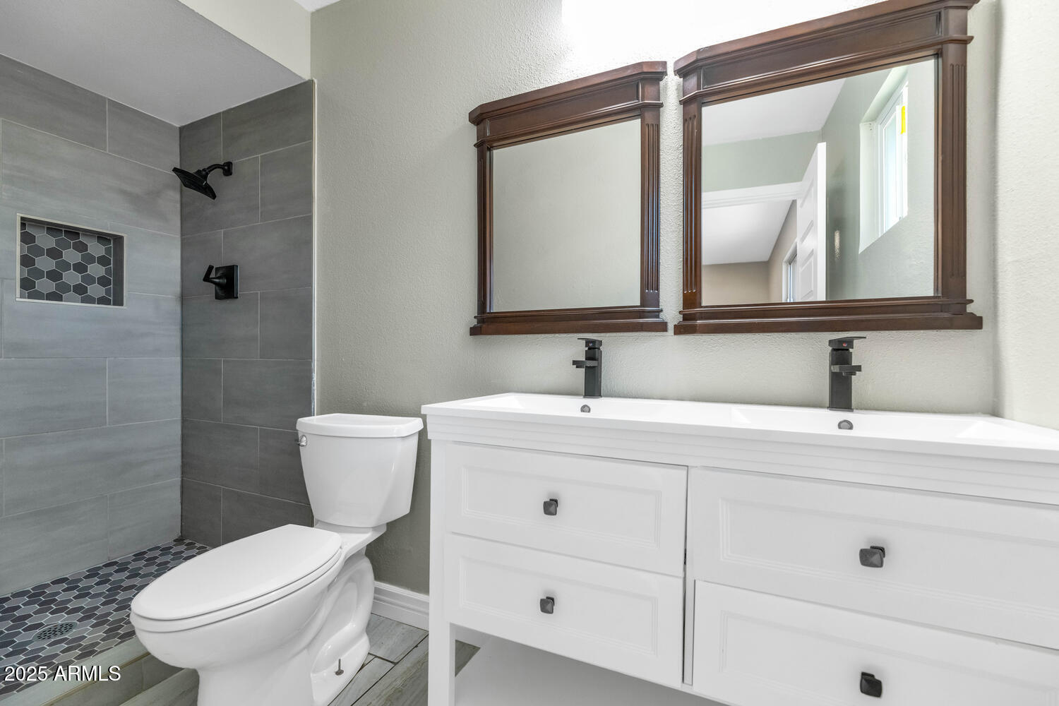 2555 South Patterson Mesa, AZ 85202 - Photo 17 of 37 a bathroom with a toilet sink and mirror