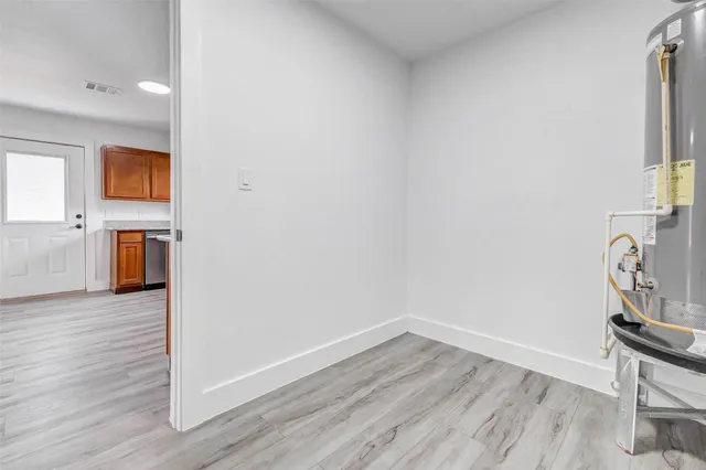 a view of kitchen with wooden floor