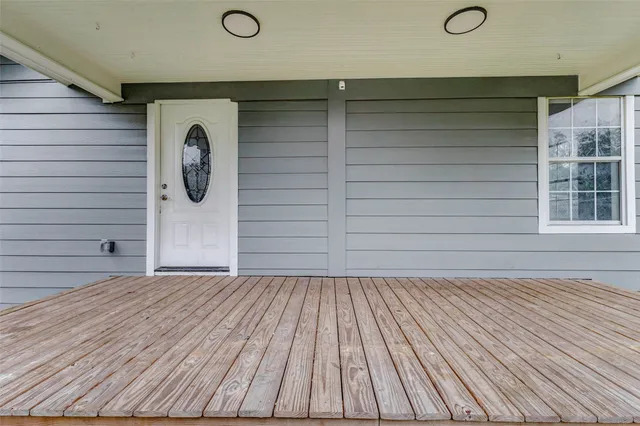 a view of a door and a window