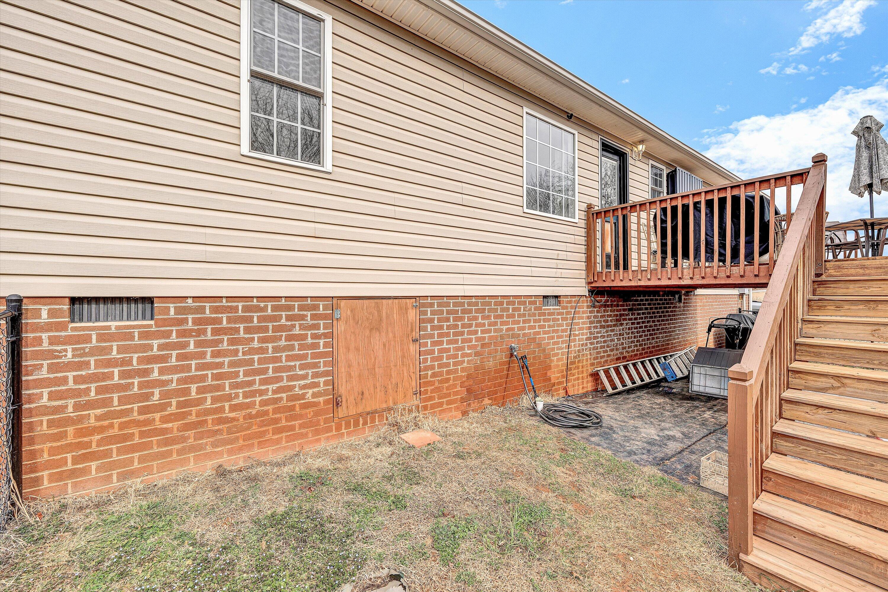 1188 Airport Road Moneta, VA 24121 - Photo 29 of 34 a view of a house with a wooden fence