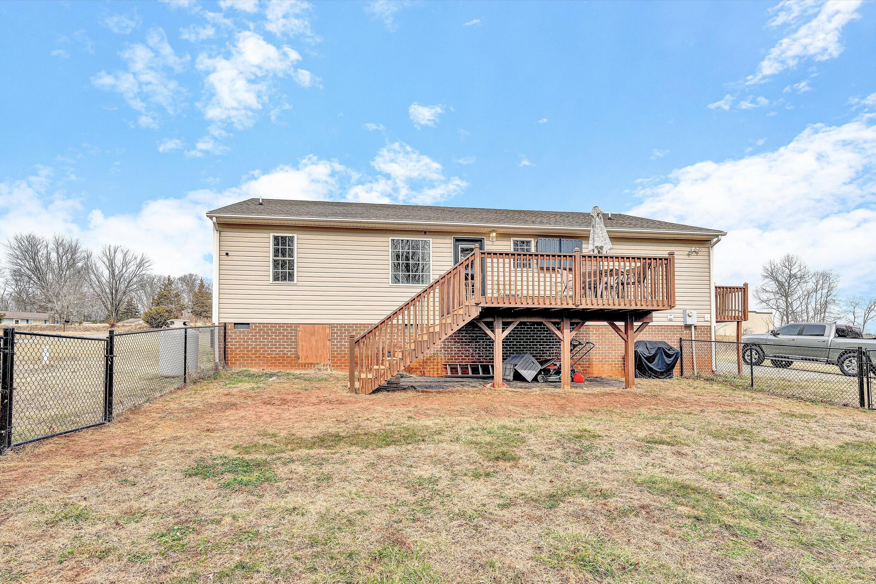 1188 Airport Road Moneta, VA 24121 - Photo 30 of 34 a view of a house with a patio