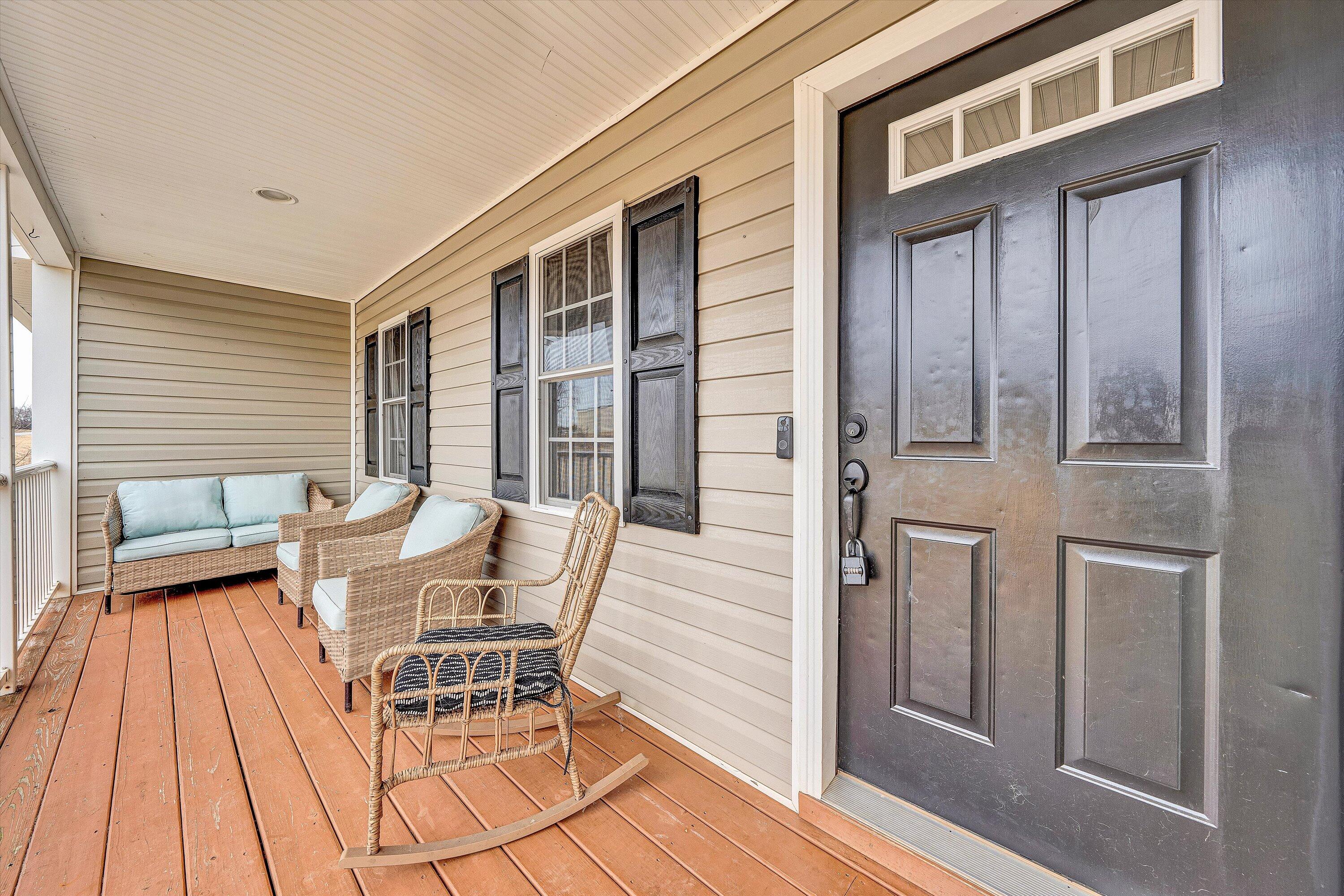1188 Airport Road Moneta, VA 24121 - Photo 7 of 34 a view of a patio with a table and chairs