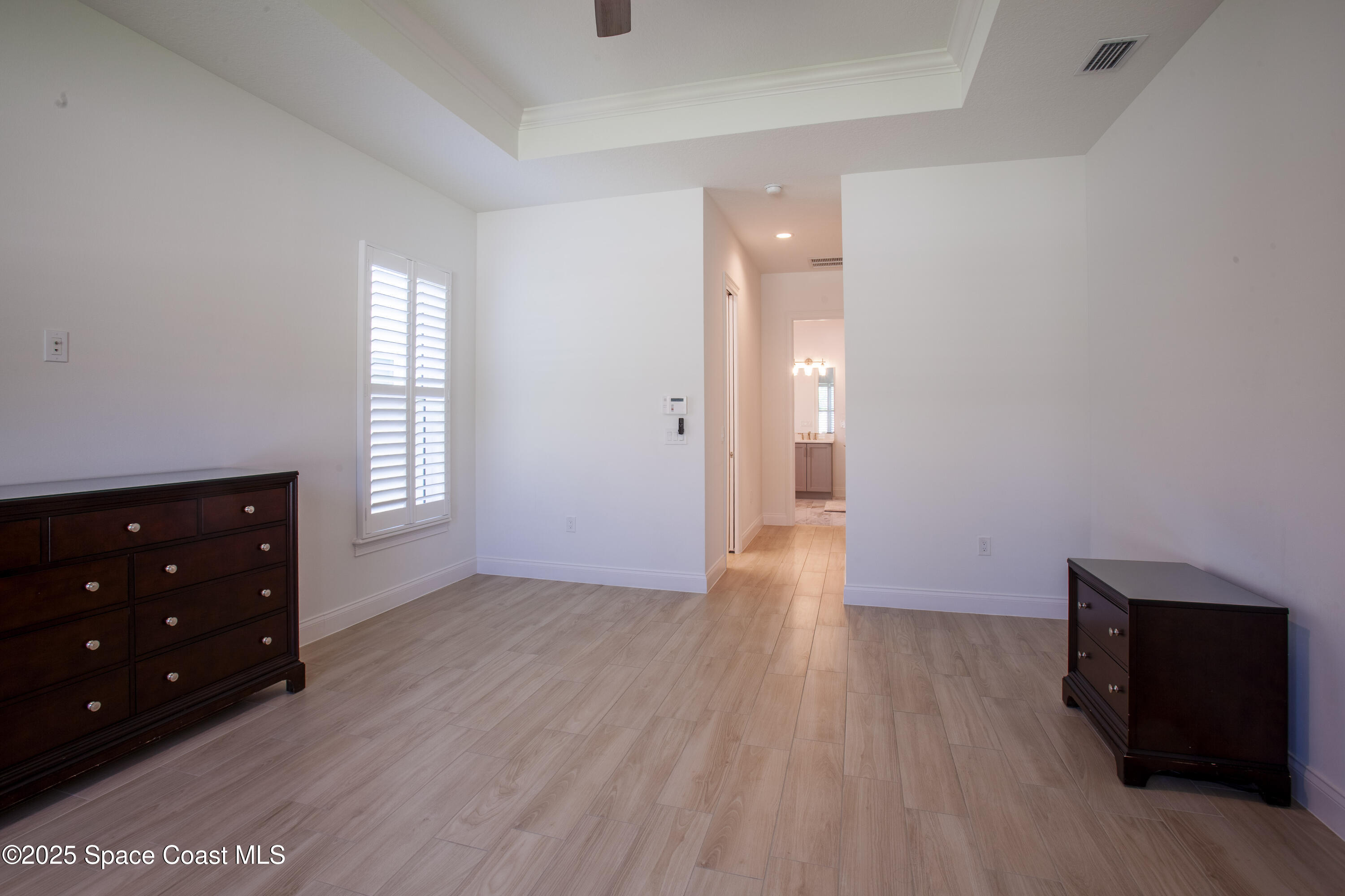 4305 Negal Circle Melbourne, FL 32901 - Photo 20 of 40 wooden floor in an empty room with a window