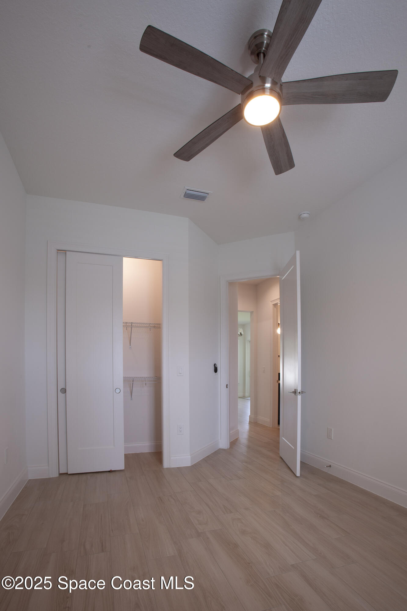 4305 Negal Circle Melbourne, FL 32901 - Photo 27 of 40 wooden floor in an empty room