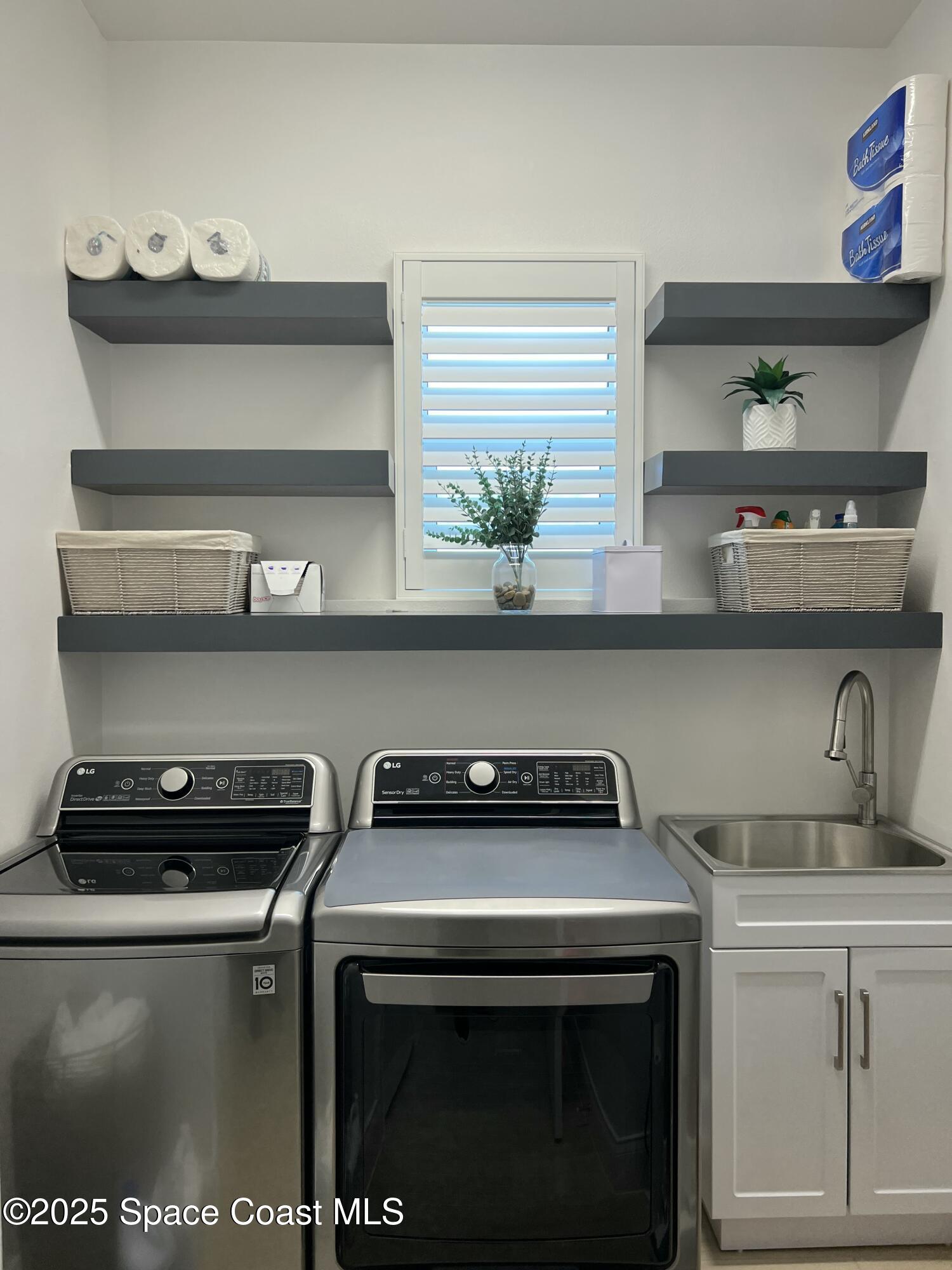 4305 Negal Circle Melbourne, FL 32901 - Photo 32 of 40 a close view of shoes stand and cabinets