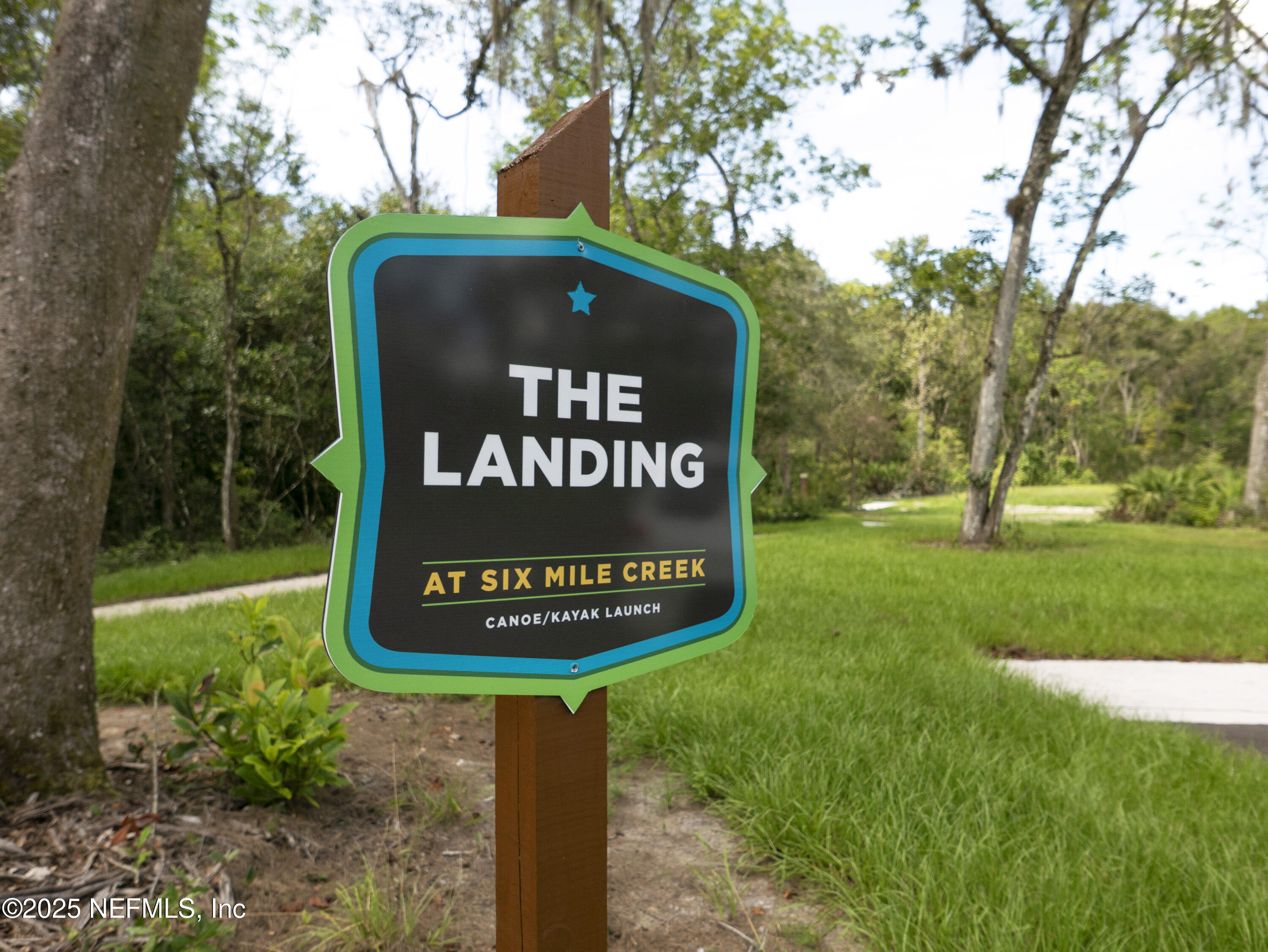 24 Bluegrass Way St. Augustine, FL 32092 - Photo 18 of 39 a sign on the side of the park