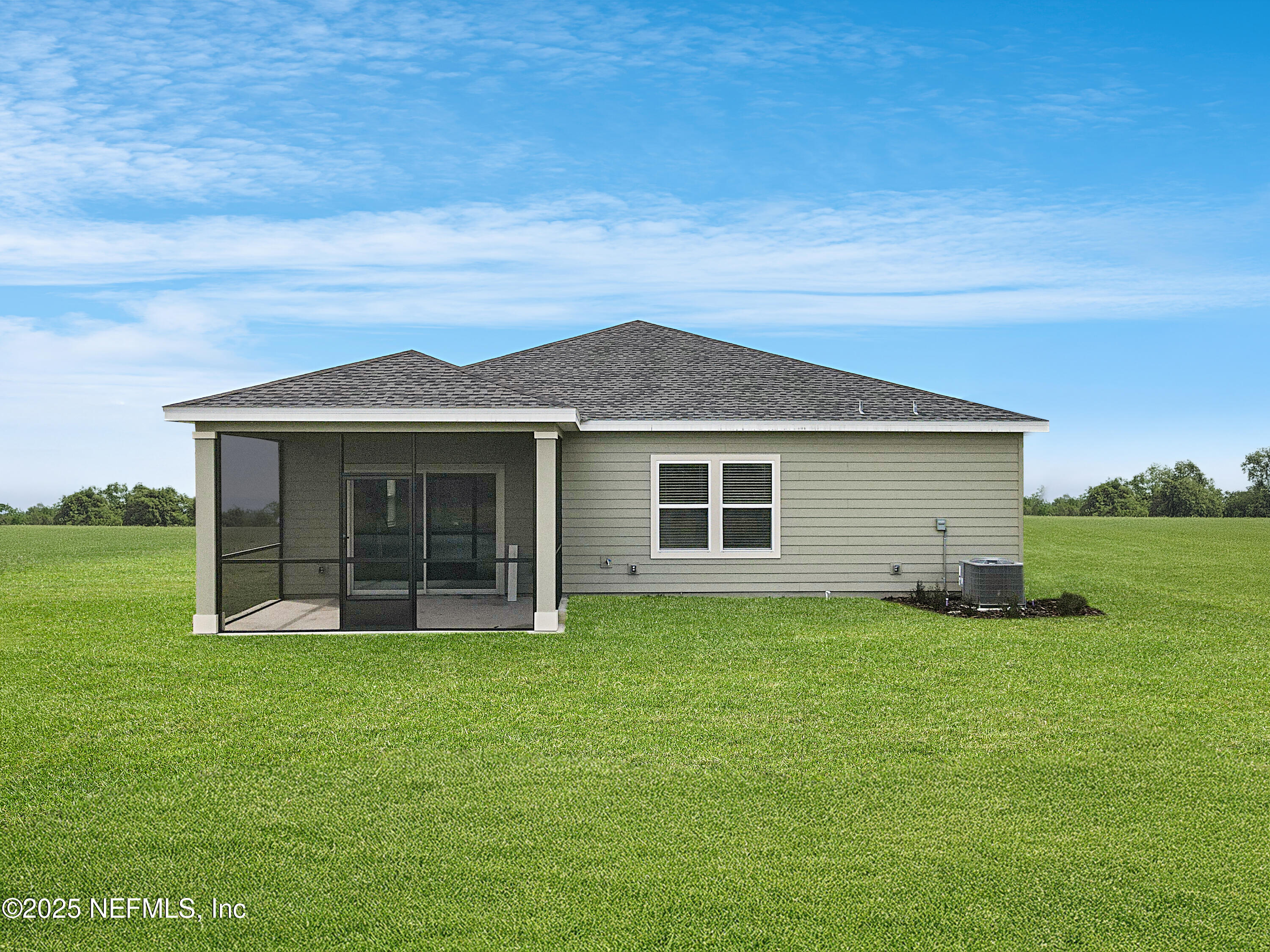 24 Bluegrass Way St. Augustine, FL 32092 - Photo 2 of 39 a view of a house with a yard