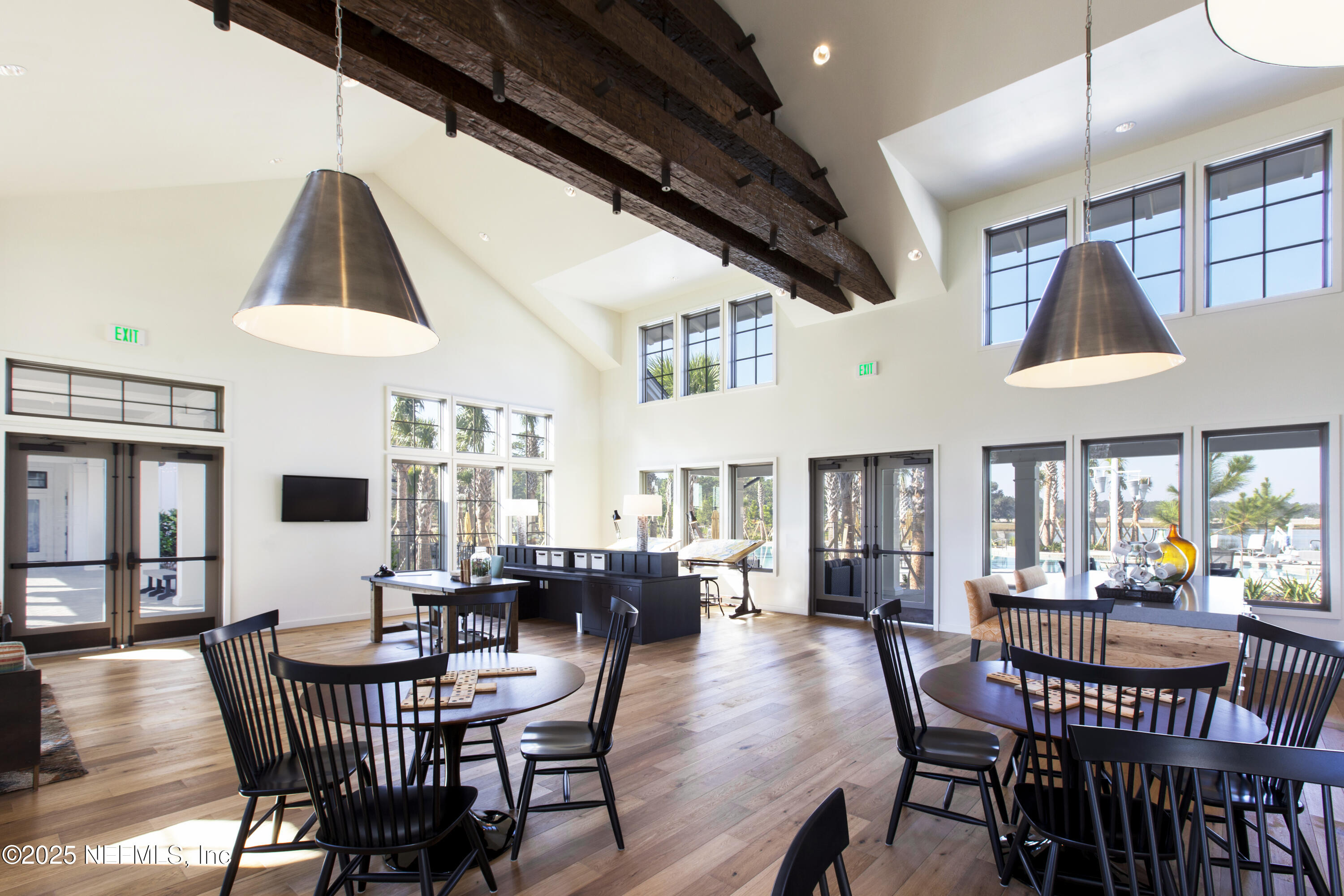 24 Bluegrass Way St. Augustine, FL 32092 - Photo 30 of 39 a dining room with furniture a window and wooden floor