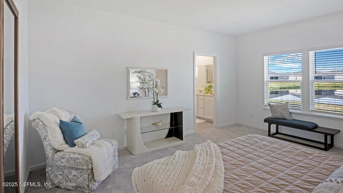 24 Bluegrass Way St. Augustine, FL 32092 - Photo 7 of 39 a bedroom with furniture and a window