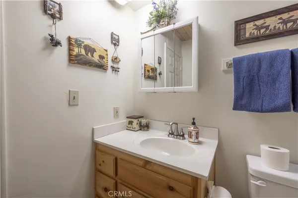 a bedroom with a bed and a machine
