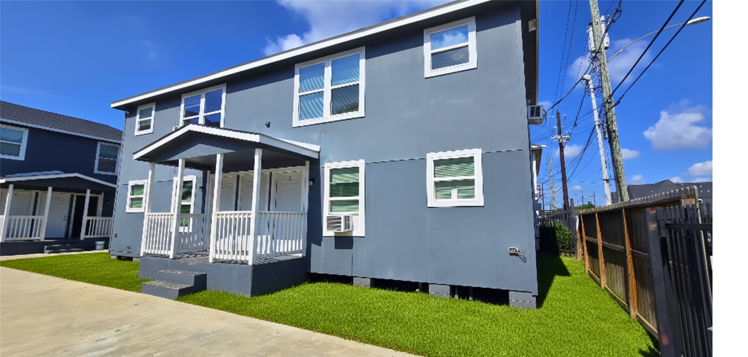 3614 Tuam Street, Unit 1 Houston, TX 77004 - Photo 2 of 6 a front view of a house with a yard and porch