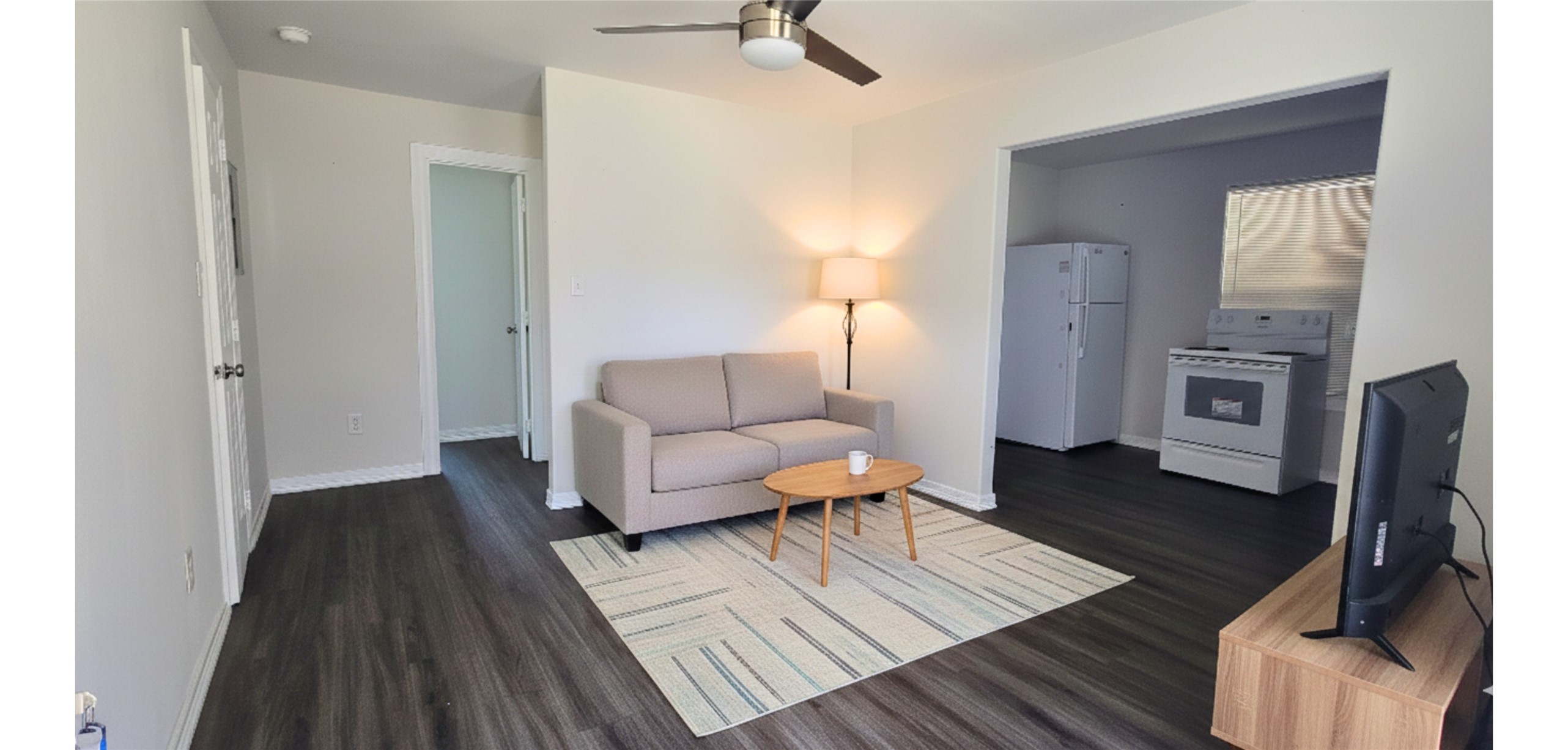 3614 Tuam Street, Unit 1 Houston, TX 77004 - Photo 3 of 6 a living room with furniture and a wooden floor