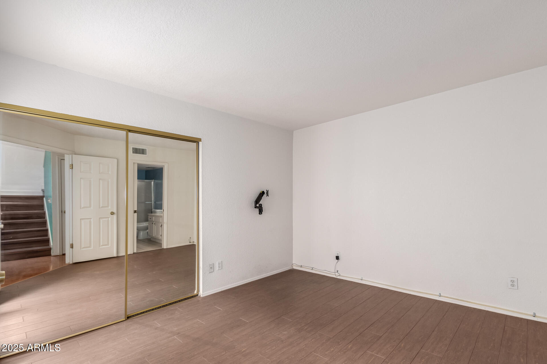 15439 North 1st Street Phoenix, AZ 85022 - Photo 13 of 26 an empty room with closet area