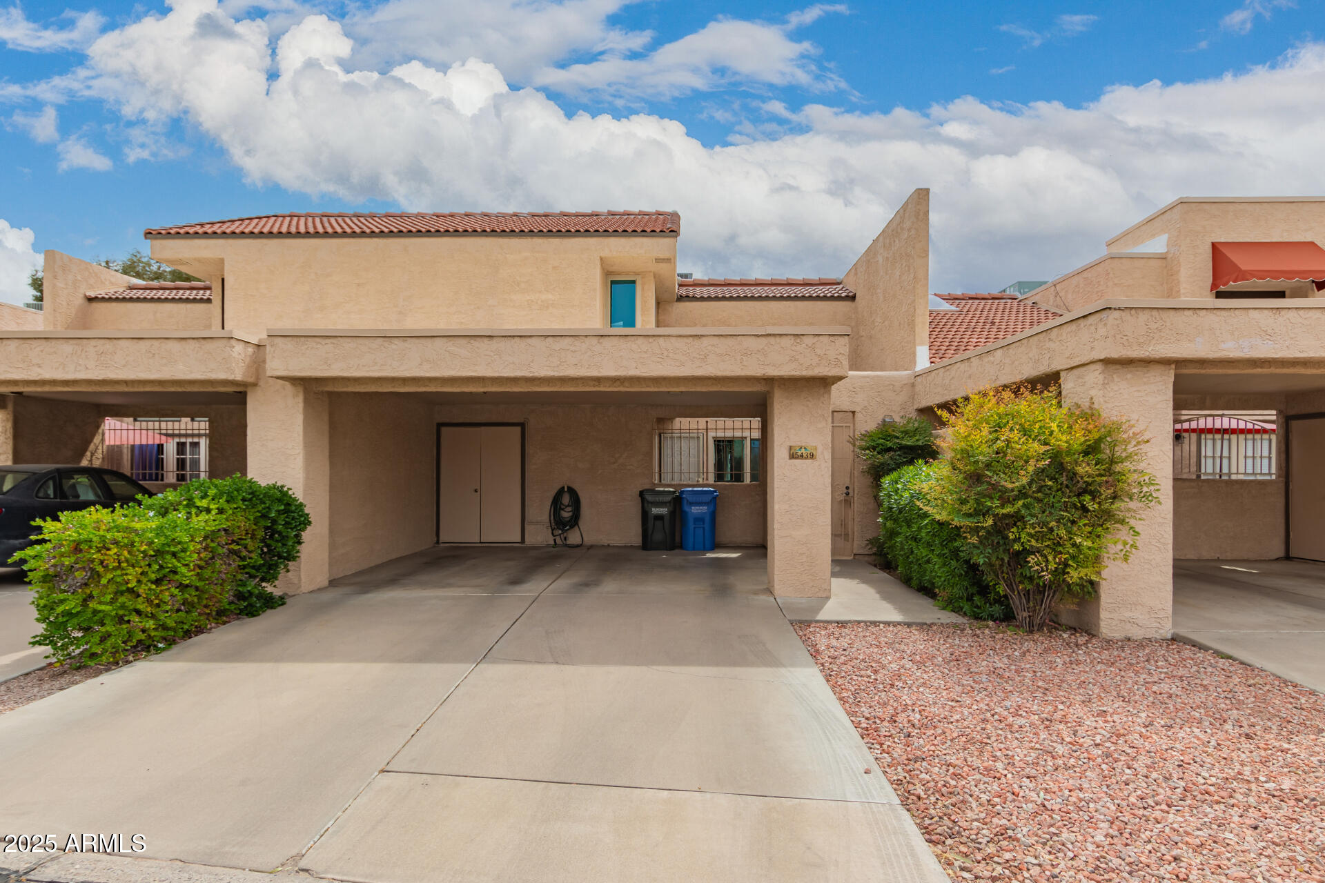 15439 North 1st Street Phoenix, AZ 85022 - Photo 2 of 26 a view of a house with potted plants