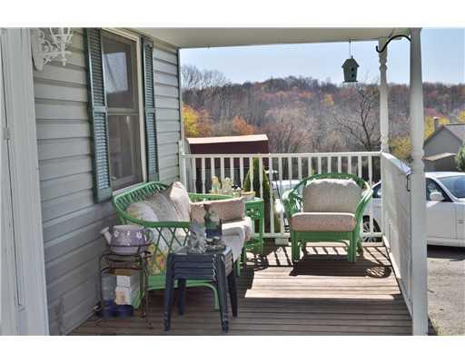 230 Goldscheitter Road Sarver, PA 16055 - Photo 14 of 14 Other. short end of front porch to the right of front door, wrap around porch goes around the left side of the house