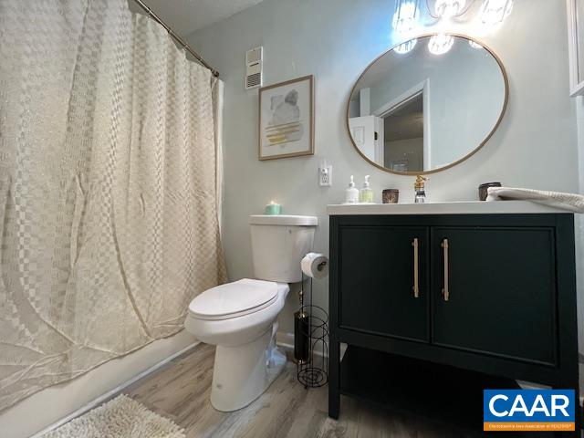 490 3 Ridges Roseland, VA 22967 - Photo 5 of 27 a bathroom with a toilet sink vanity granite and a mirror