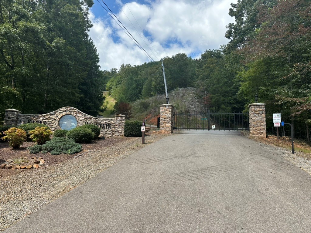 Lot 8-8a Bergan Moore Road Murphy, NC 28906 - Photo 13 of 13 a view of backyard with a table and chairs and a fire pit