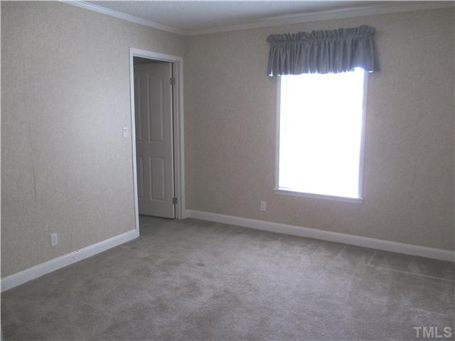 9501 Neils Branch Road Raleigh, NC 27603 - Photo 14 of 21 Large second bedroom with walk in closet.