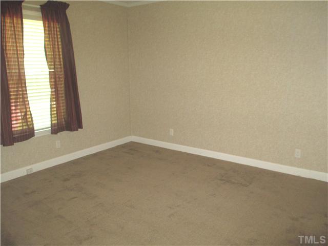 9501 Neils Branch Road Raleigh, NC 27603 - Photo 16 of 21 Third bedroom with walk in closet.