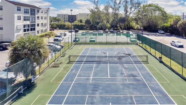 a view of community park with large trees