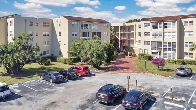 a front view of a house with yard