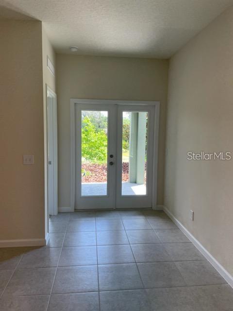 2332 Litchfield Loop DeLand, FL 32720 - Photo 7 of 15 a view of an empty room with a window
