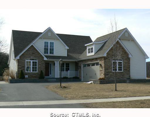 40 Stratton Farms Road Suffield, CT 06093 - Photo 1 of 1 a view of a yard in front of a house