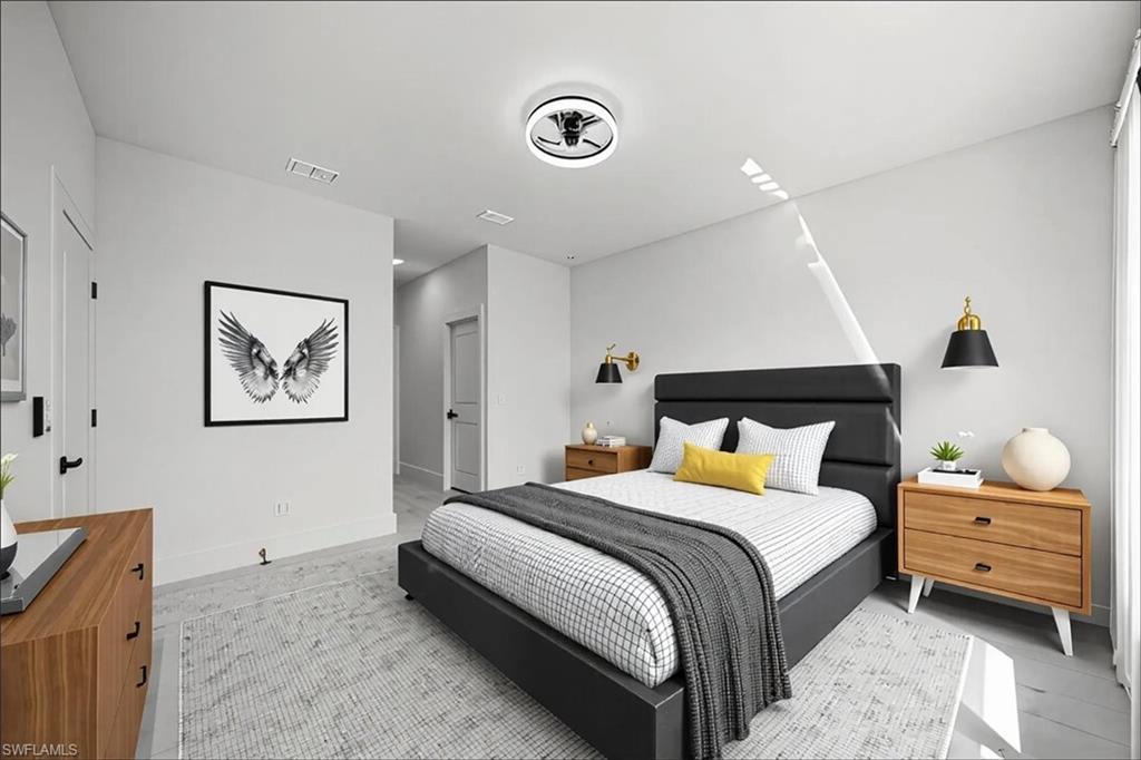 3315 67th Street West Lehigh Acres, FL 33971 - Photo 23 of 38 Bedroom featuring baseboards