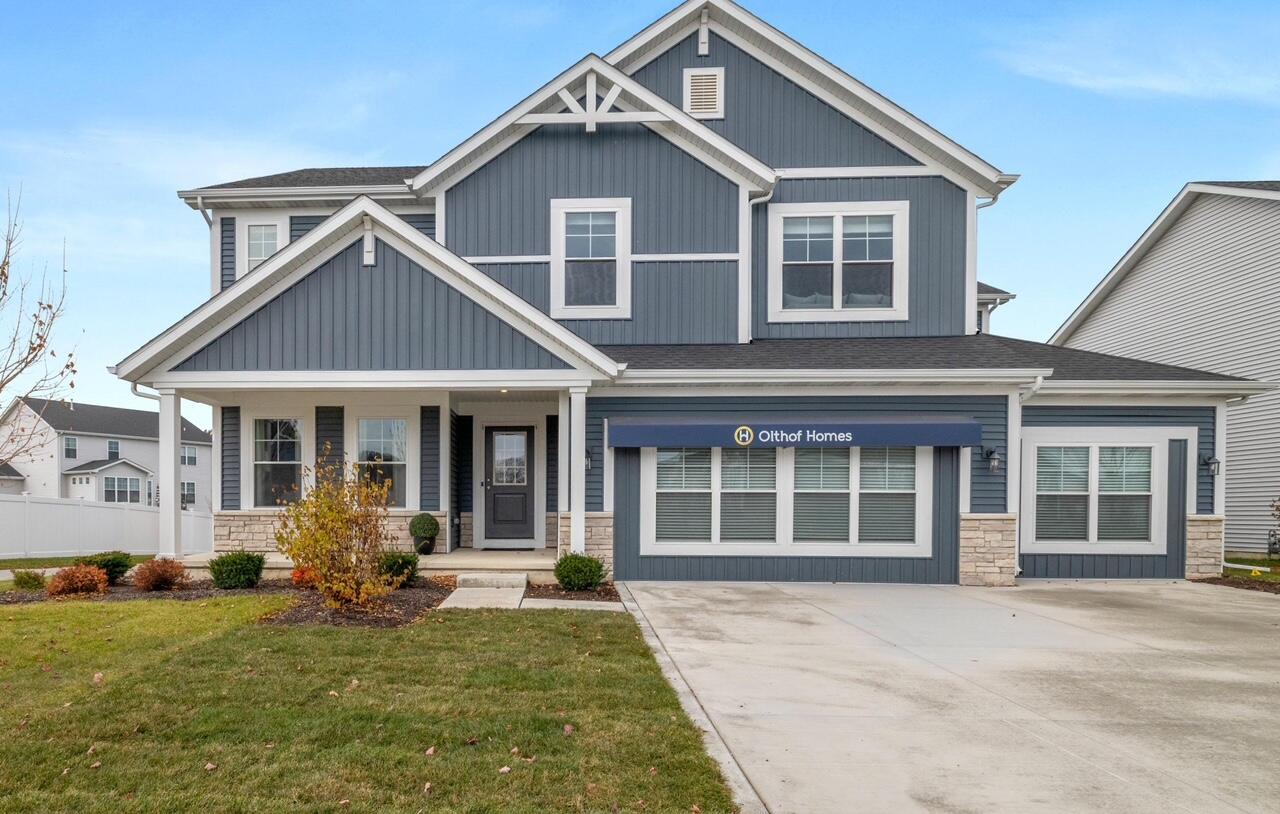 Undisclosed Address Winfield, IN 46307 - Photo 1 of 25 a front view of a house with garden