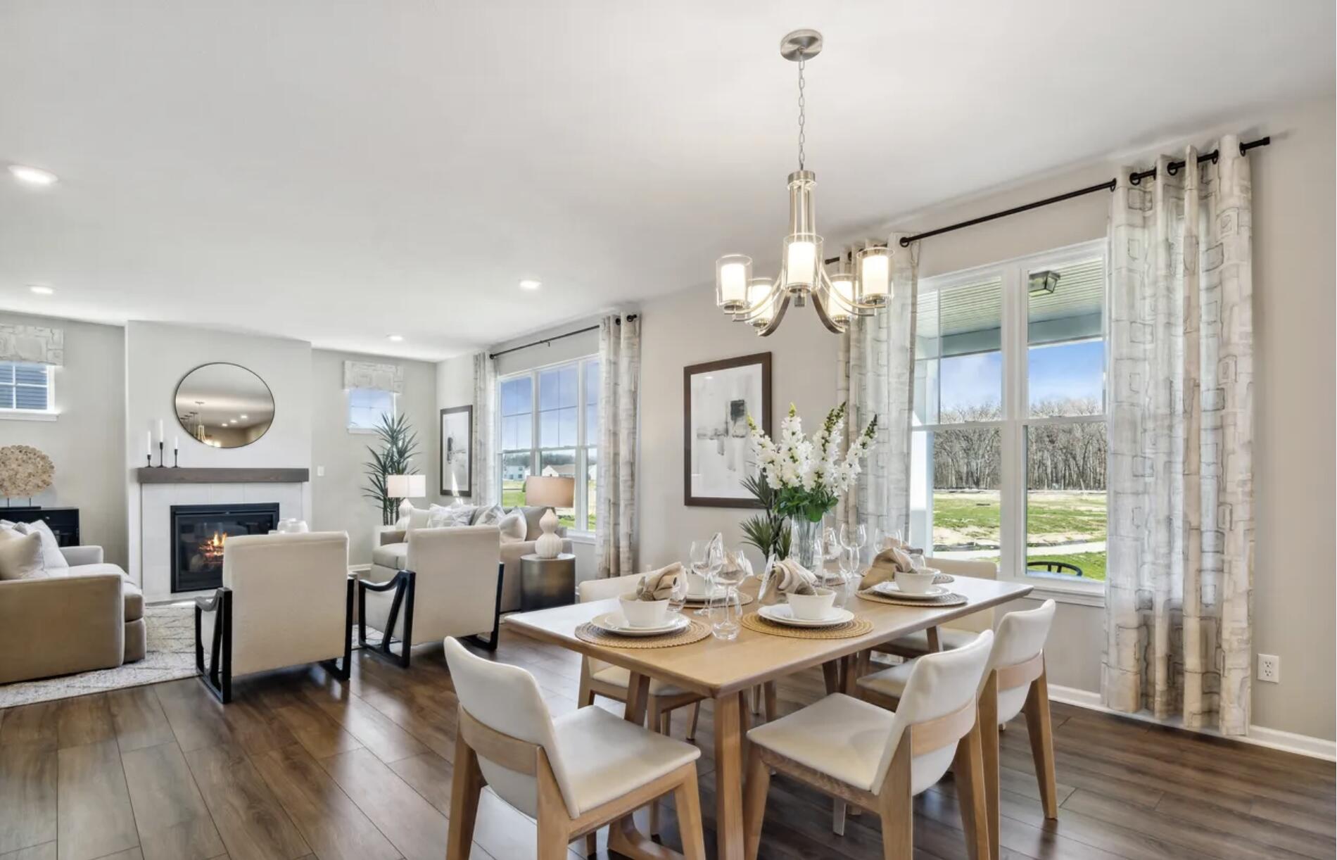 Undisclosed Address Winfield, IN 46307 - Photo 11 of 25 a view of a dining room with furniture window and wooden floor
