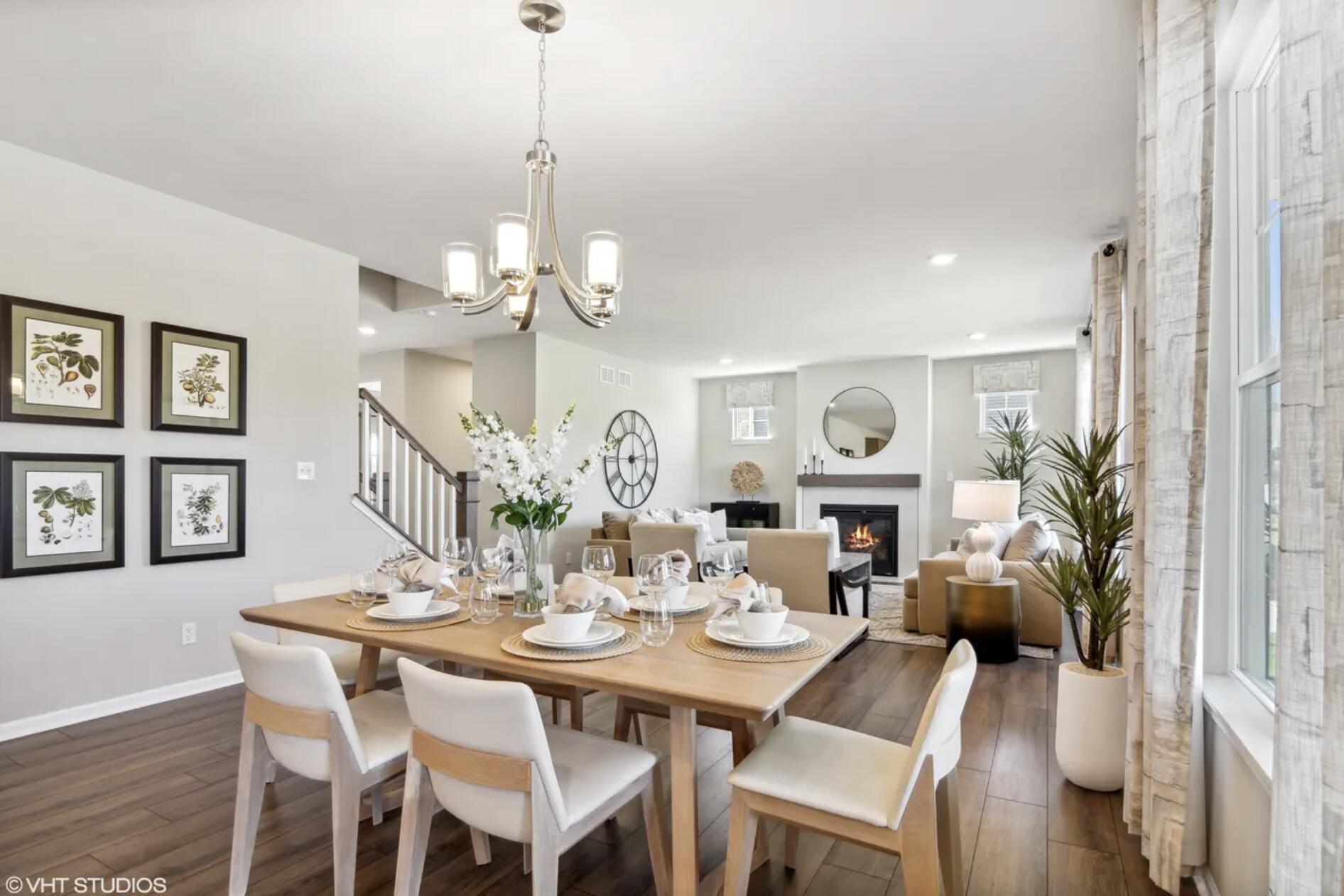 Undisclosed Address Winfield, IN 46307 - Photo 12 of 25 a view of a dining room with furniture and wooden floor