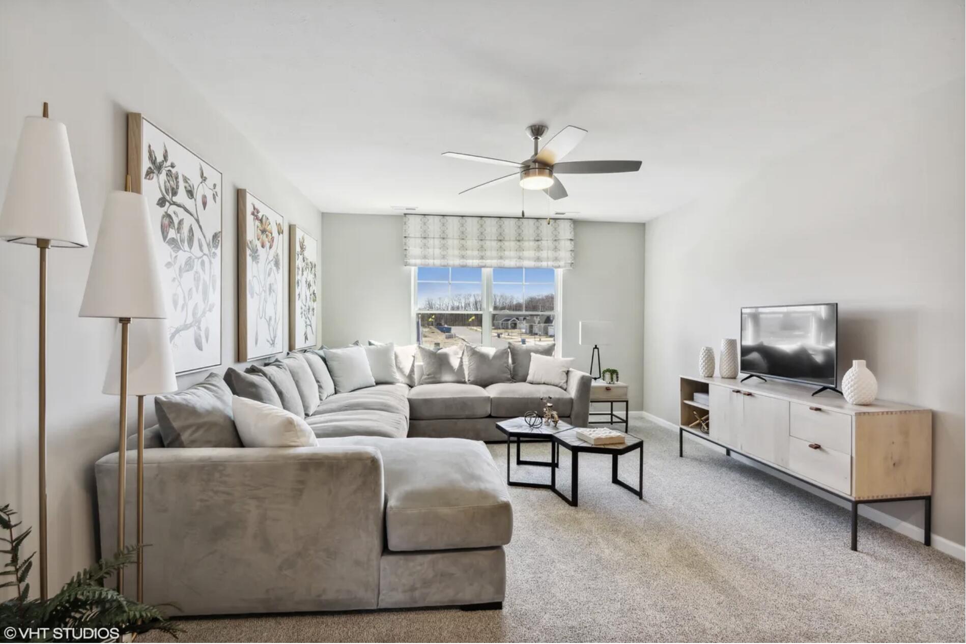 Undisclosed Address Winfield, IN 46307 - Photo 17 of 25 a living room with furniture and a flat screen tv