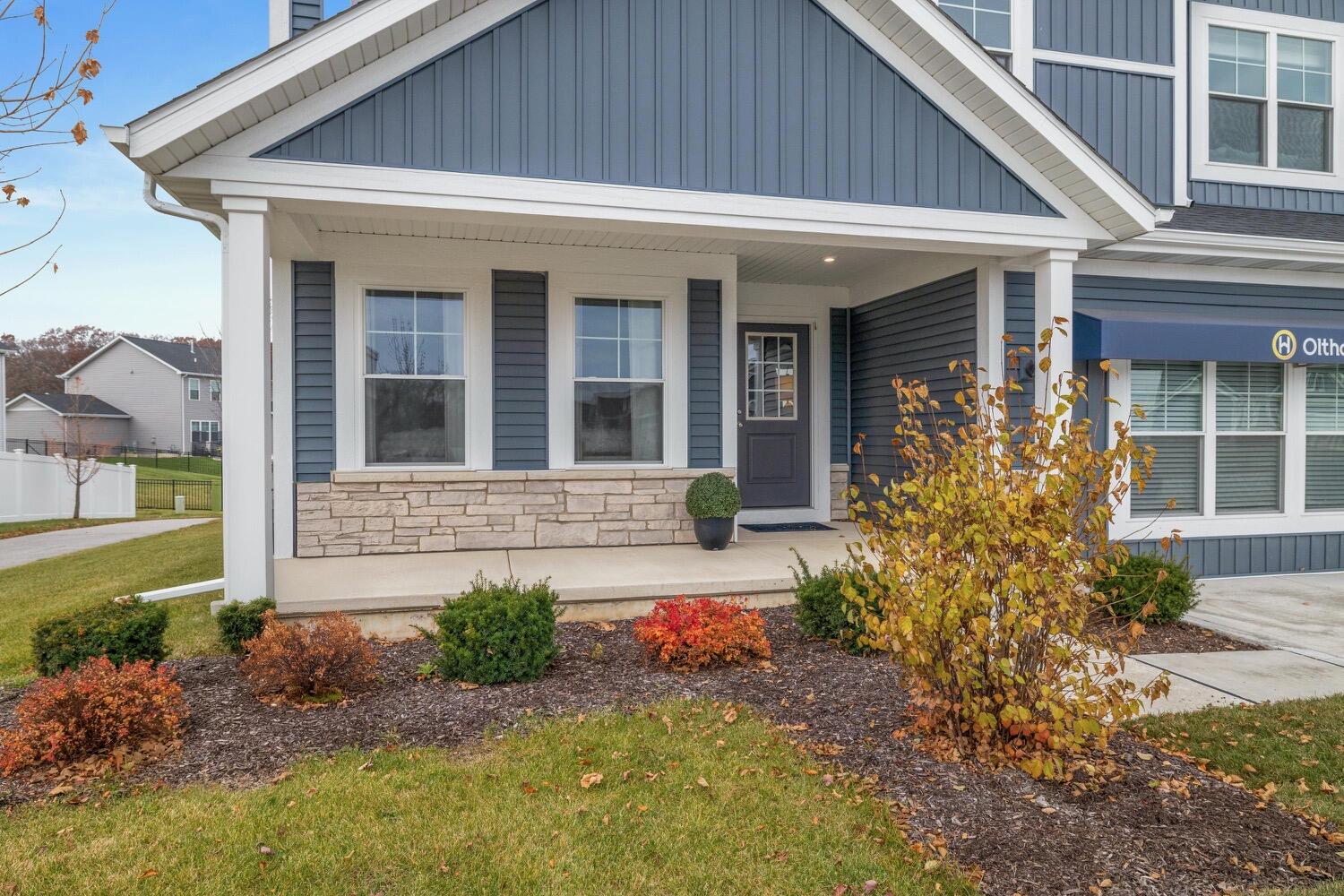 Undisclosed Address Winfield, IN 46307 - Photo 2 of 25 a front view of a house with garden