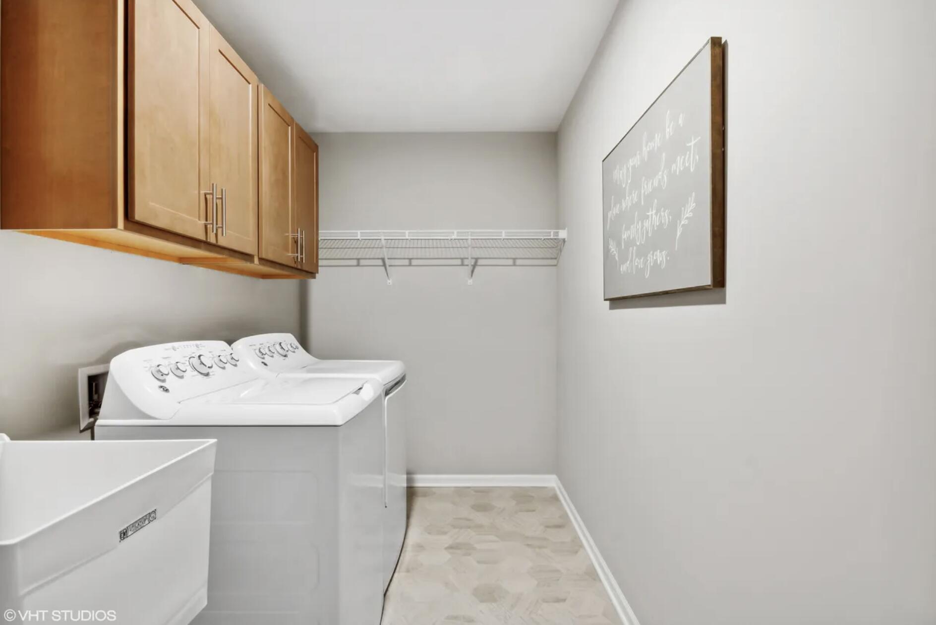 Undisclosed Address Winfield, IN 46307 - Photo 24 of 25 a utility room with cabinets