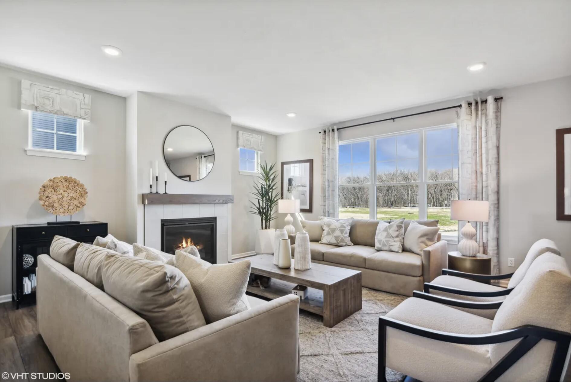 Undisclosed Address Winfield, IN 46307 - Photo 5 of 25 a living room with furniture and a fireplace