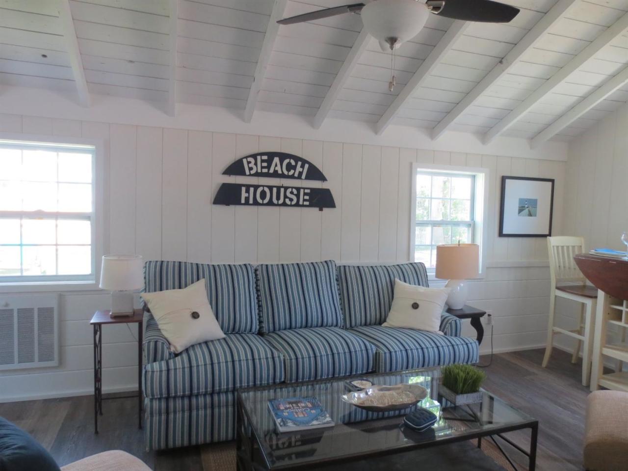 248 Old Wharf Road, Unit E2 Dennis Port, MA 02639 - Photo 11 of 27 a living room with furniture