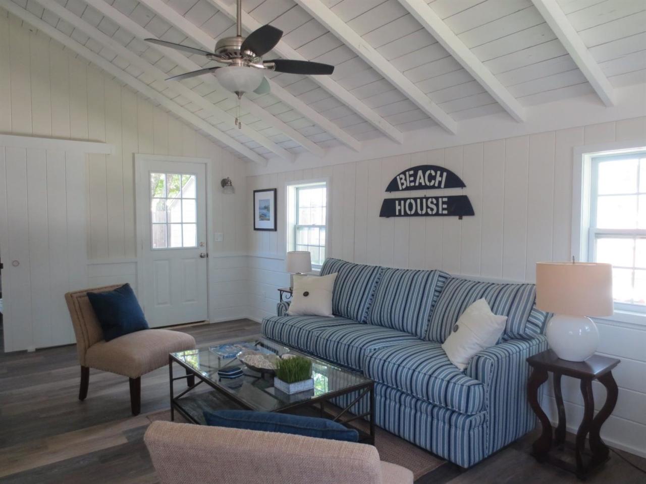 248 Old Wharf Road, Unit E2 Dennis Port, MA 02639 - Photo 10 of 27 a living room with furniture