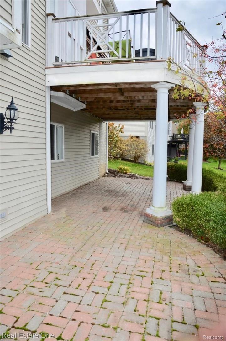 85 Ridge Field Court Oxford, MI 48371 - Photo 28 of 31 Deck over Patio