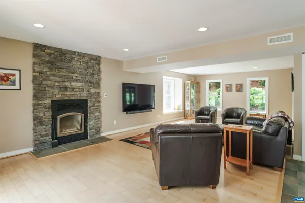 a kitchen with stainless steel appliances granite countertop a refrigerator and a stove