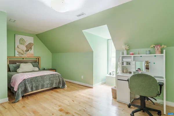 a workspace with furniture and a window