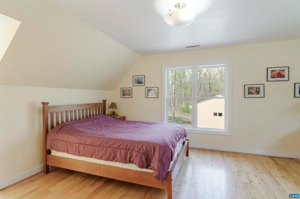 a view of a kitchen with furniture and a window