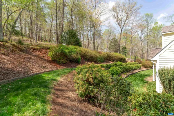 a view of backyard with green space