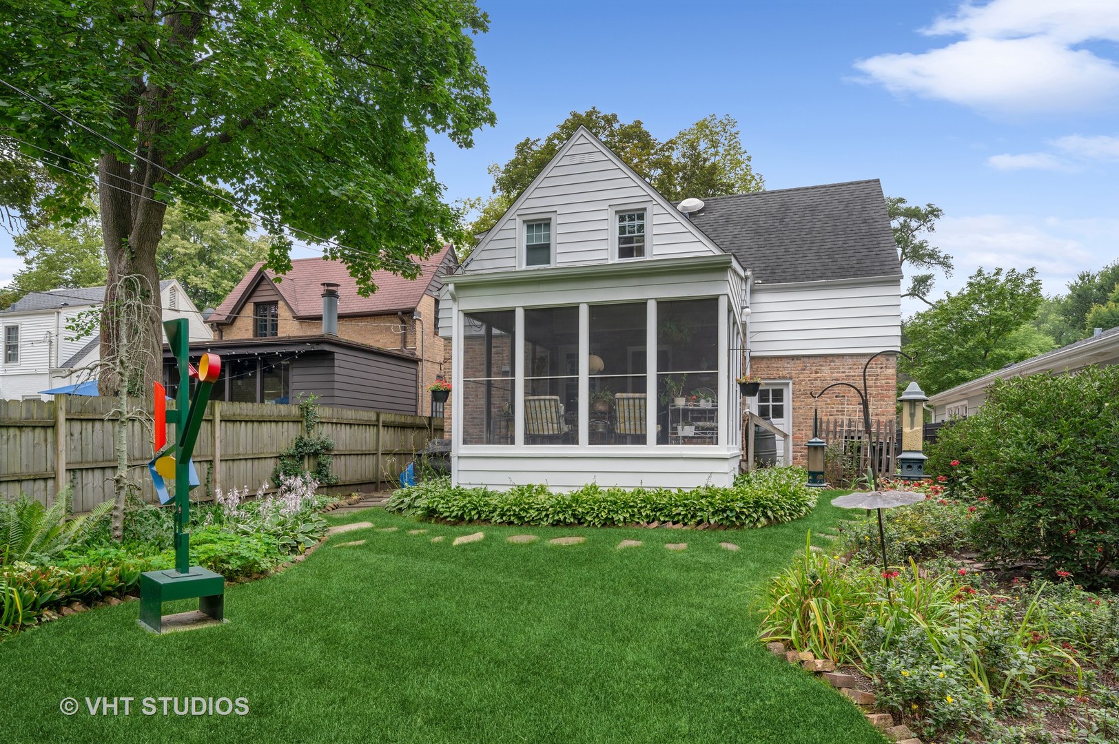 727 Hunter Road Glenview, IL 60025 - Photo 18 of 27 a front view of a house with a yard