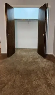 a kitchen with a wooden cabinets and a stove top oven