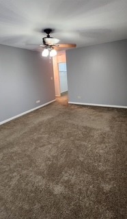 7730 Dempster Street, Unit 209 Morton Grove, IL 60053 - Photo 7 of 32 a view of an empty room