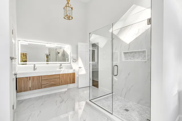 a white bath tub sitting next to a window