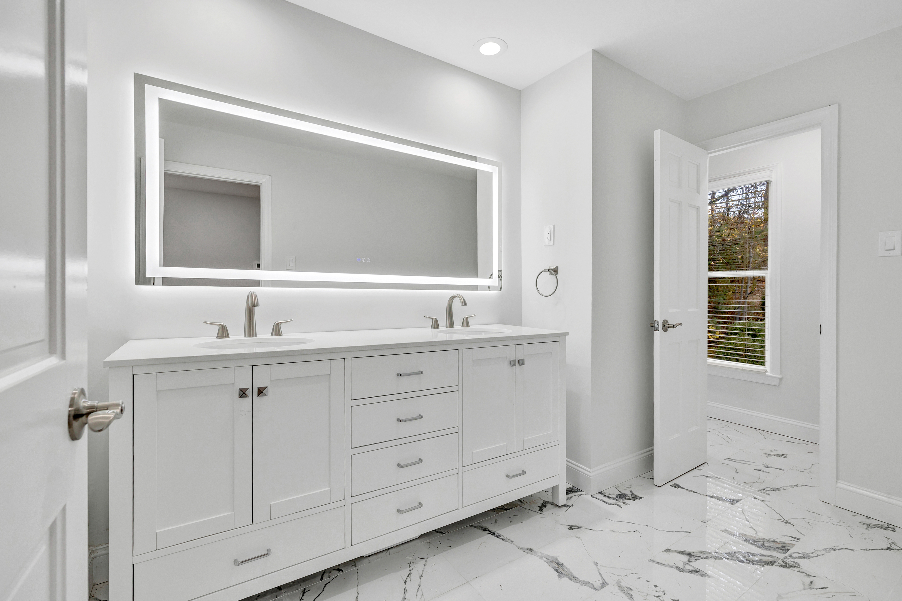 93 Putting Green Road North Trumbull, CT 06611 - Photo 29 of 40 a bathroom with double sink and a mirror