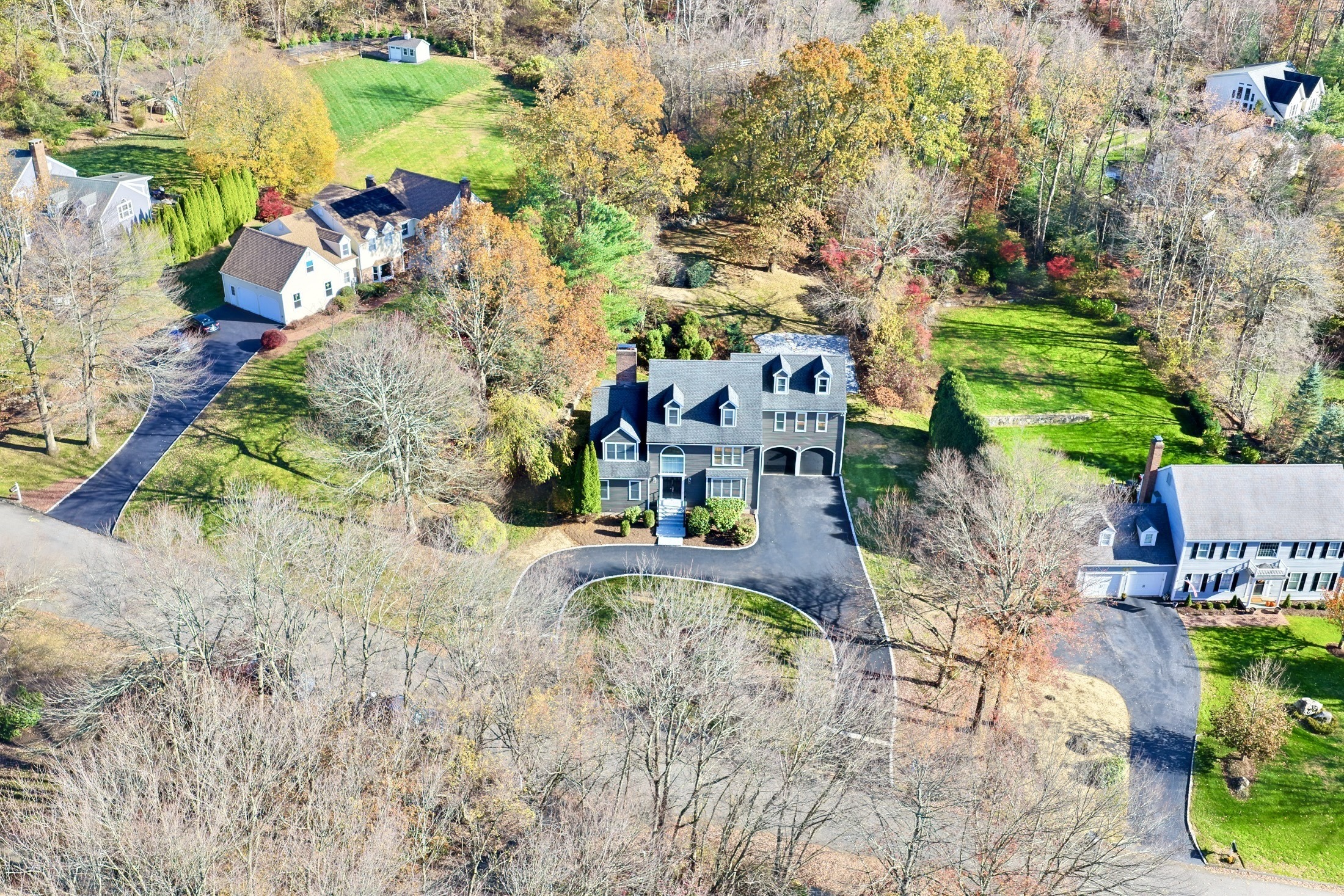 93 Putting Green Road North Trumbull, CT 06611 - Photo 40 of 40 a view of a yard with plants and large trees